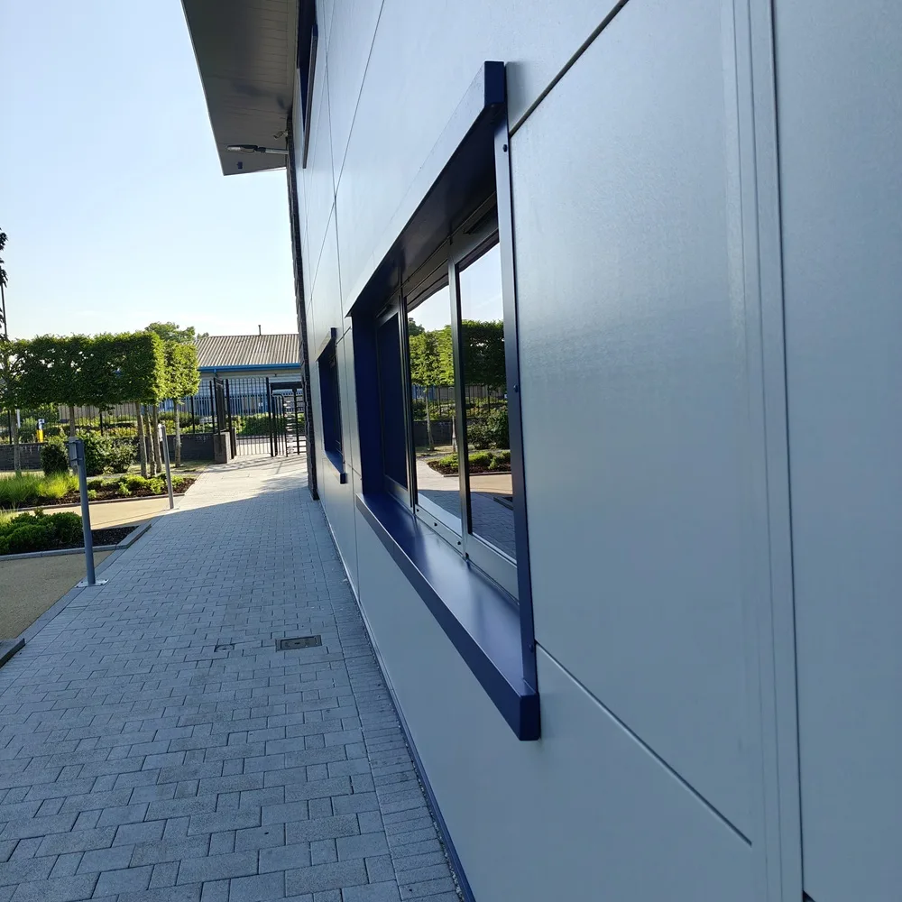 Clean windows along a modern office building